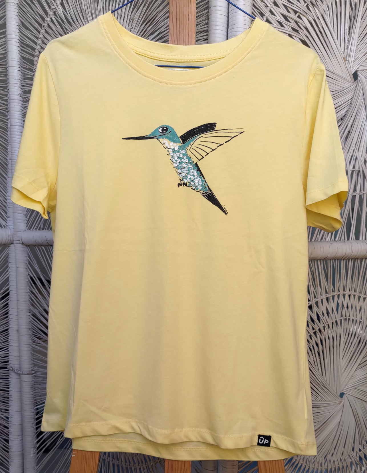 Handmade handpainted hummingbird on yellow shirt by Carla Ventresca