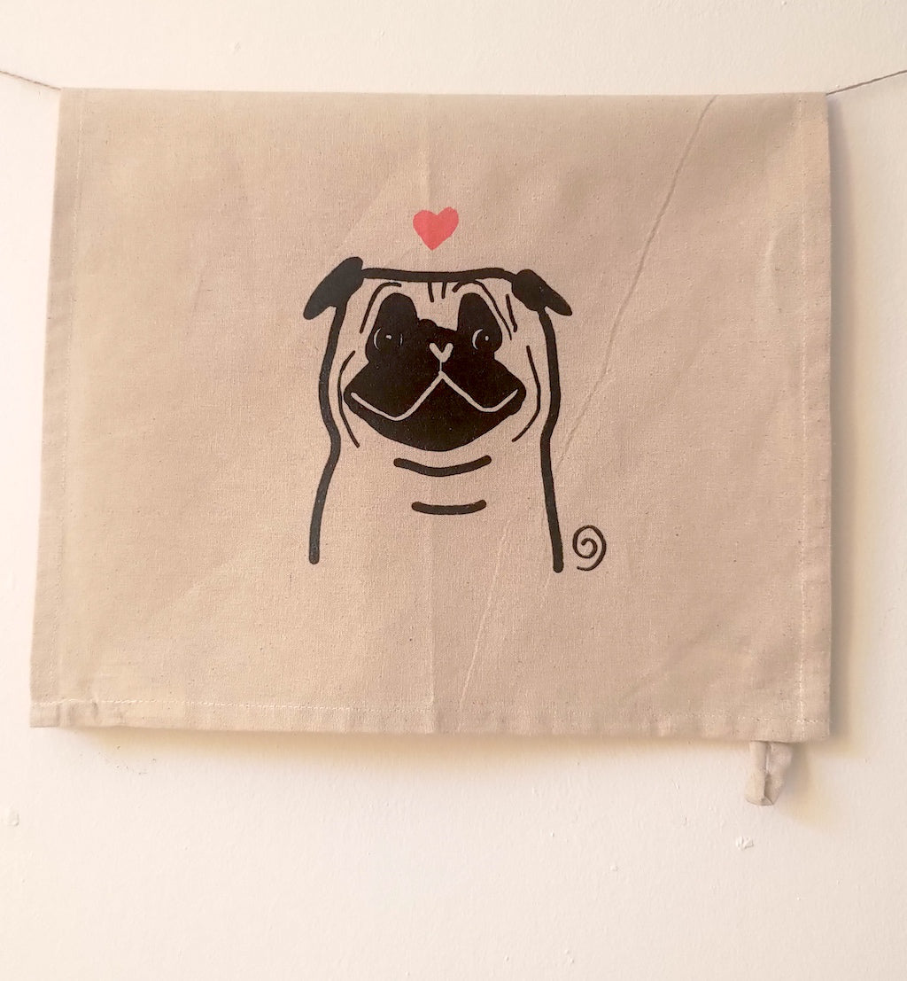 Handmade pug dog with heart on cotton tea towel by Studio Carla Ventresca Miller Art